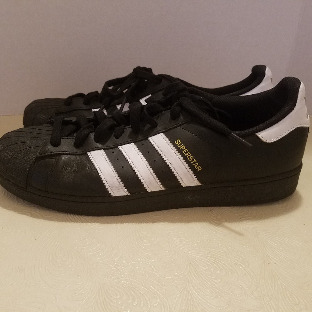 Men's Adidas Superstar athletic shoes size 11